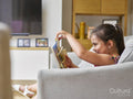 Girl playing on sofa