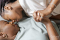 Directly above view of couple holding hands