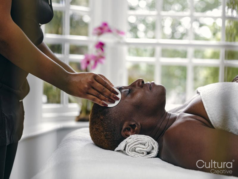 Mature woman receiving beauty treatment