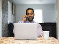 Man working on laptop from home