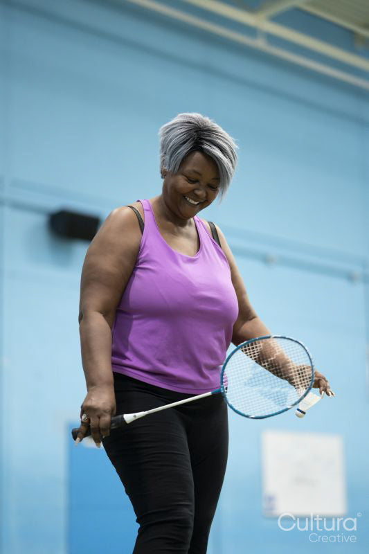 Woman playing badminton