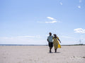 Mature couple walking on beach