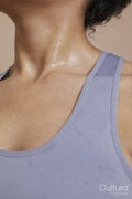 Close-up of athletic woman with sweat of skin