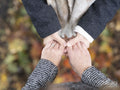 High angle of women holding hands