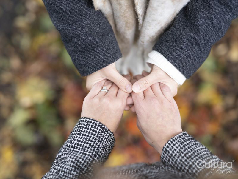 High angle of women holding hands
