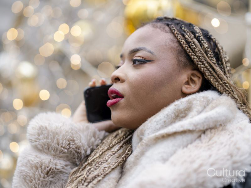 Young woman talking on phone