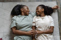 Directly above view of couple lying down on carpet
