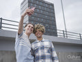 Smiling male couple taking selfie