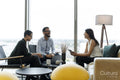 Business people having meeting in office lobby