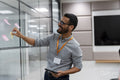 Man using adhesive notes in office