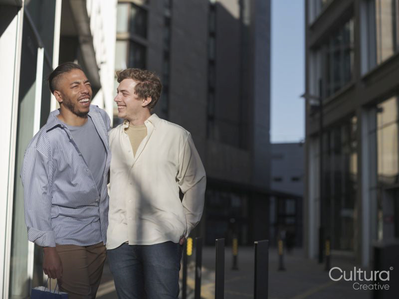 South Yorkshire, Smiling couple walking in city