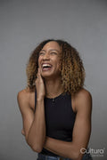 Portrait of laughing woman with curly hair