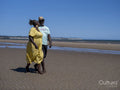 Mature couple walking on beach