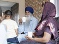 Grandparents and grandson relaxing at home