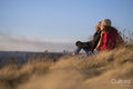 Female friends looking at landscape at sunset