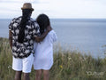Couple looking at sea from cliff