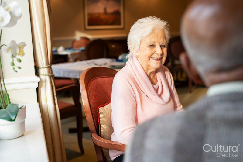 Senior people talking in nursing home