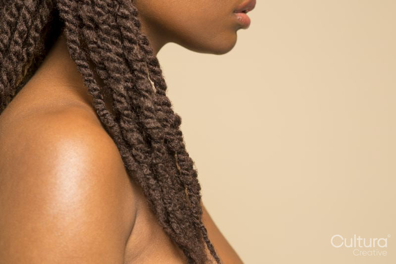 Close-up of woman with braided hair