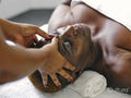 Mature woman having head massage