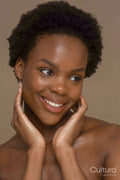 Studio portrait of smiling woman