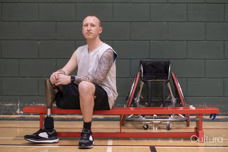 Portrait of male basketball player with artificial leg