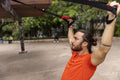 Man exercising in park
