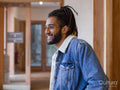 Portrait of young man with dreadlocks