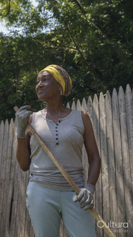 Senior woman working in backyard