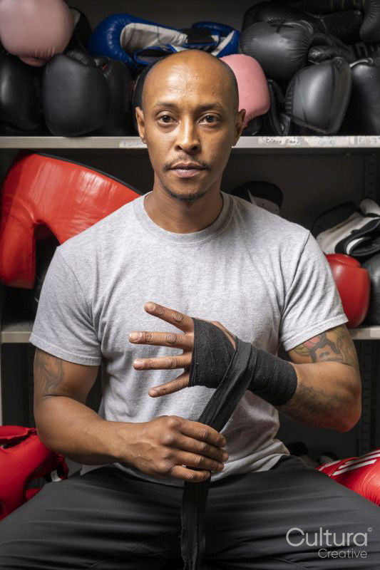 Portrait of man preparing for boxing fight