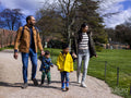 Parents with two sons in park