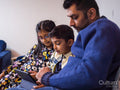 Father and children using digital tablet