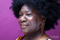 Studio shot of mature woman with big hair