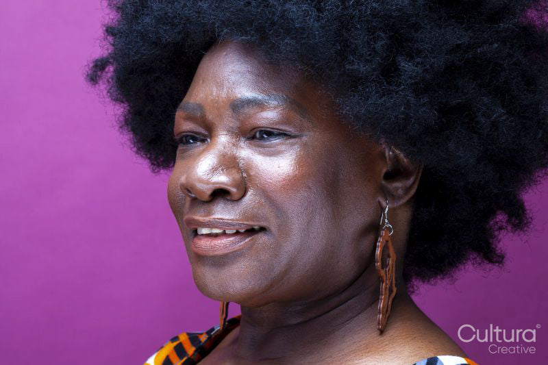 Studio shot of mature woman with big hair