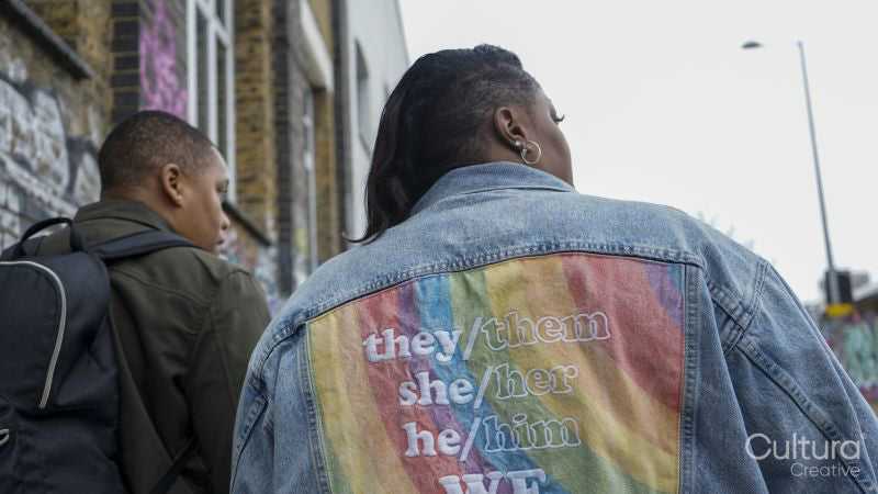 Two women walking in city, rear view