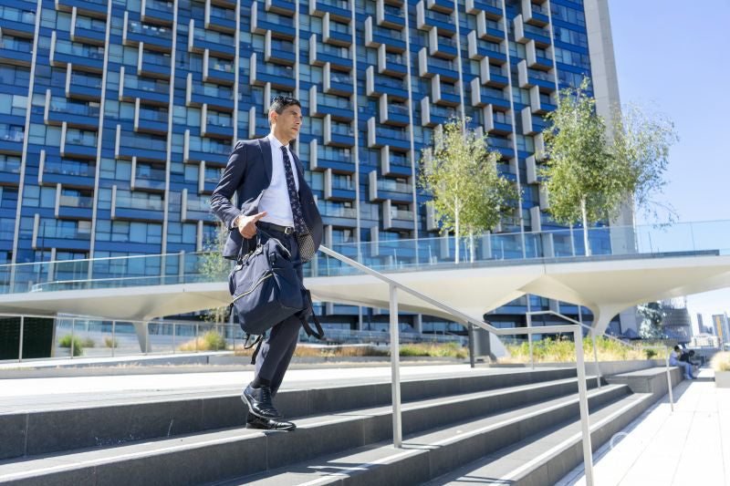 Businessman walking in business district