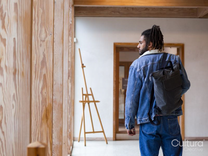 Rear view of young man with backpack