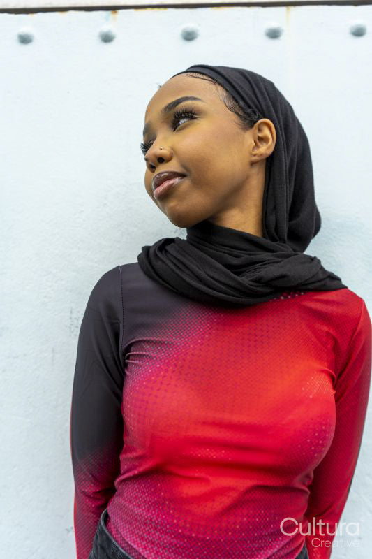 Portrait of young woman wearing hijab