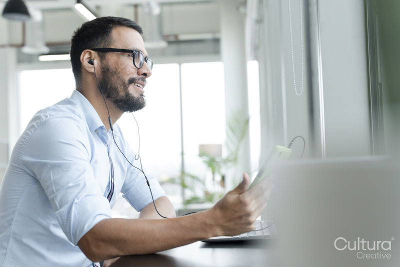 Businessman with laptop working in modern office