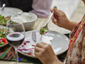 Close-up of woman eating salad