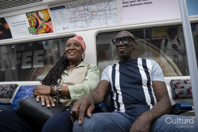 Mature couple traveling by subway