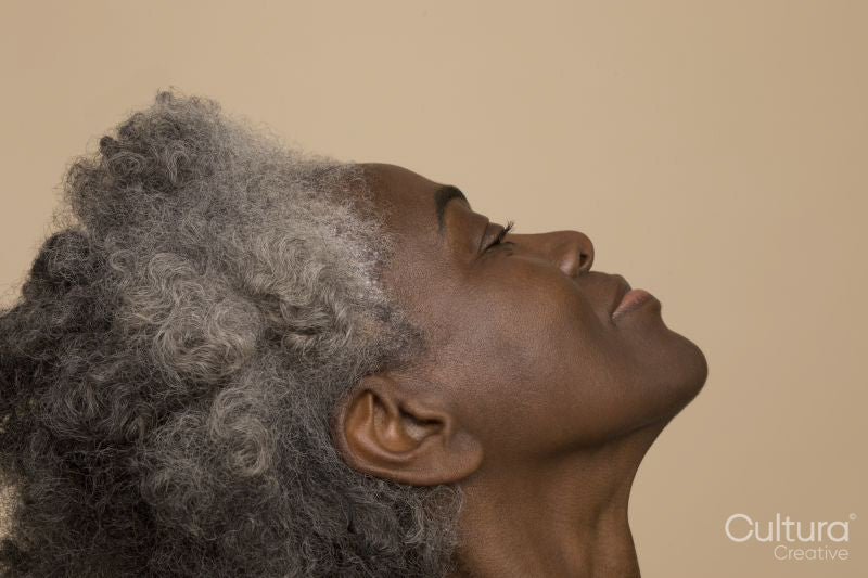 Profile of smiling mature woman