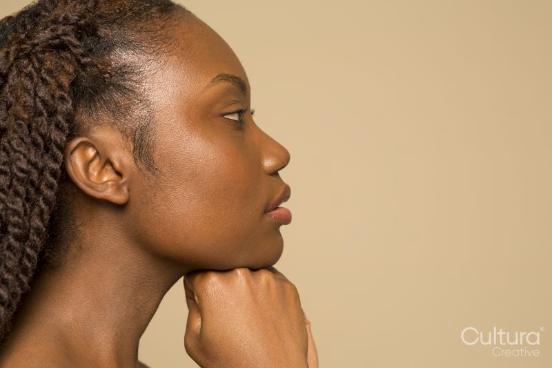 Profile of woman with braided hair