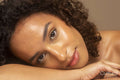 Close-up of woman with curly hair