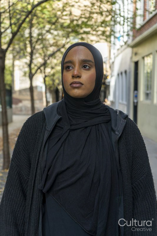 Portrait of young woman wearing hijab