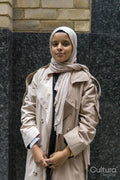 Portrait of young woman wearing hijab
