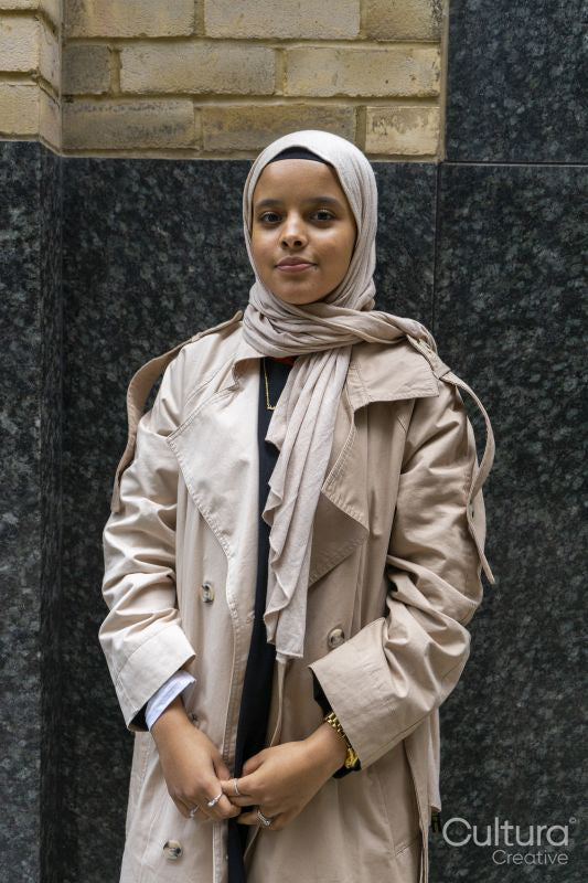 Portrait of young woman wearing hijab