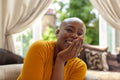 Bald mature woman laughing