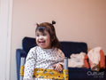 Girl with Down syndrome in standing frame