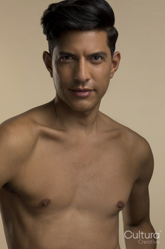 Studio portrait of shirtless man