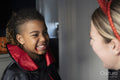 Close-up of smiling woman with son dressed as vampire for Halloween